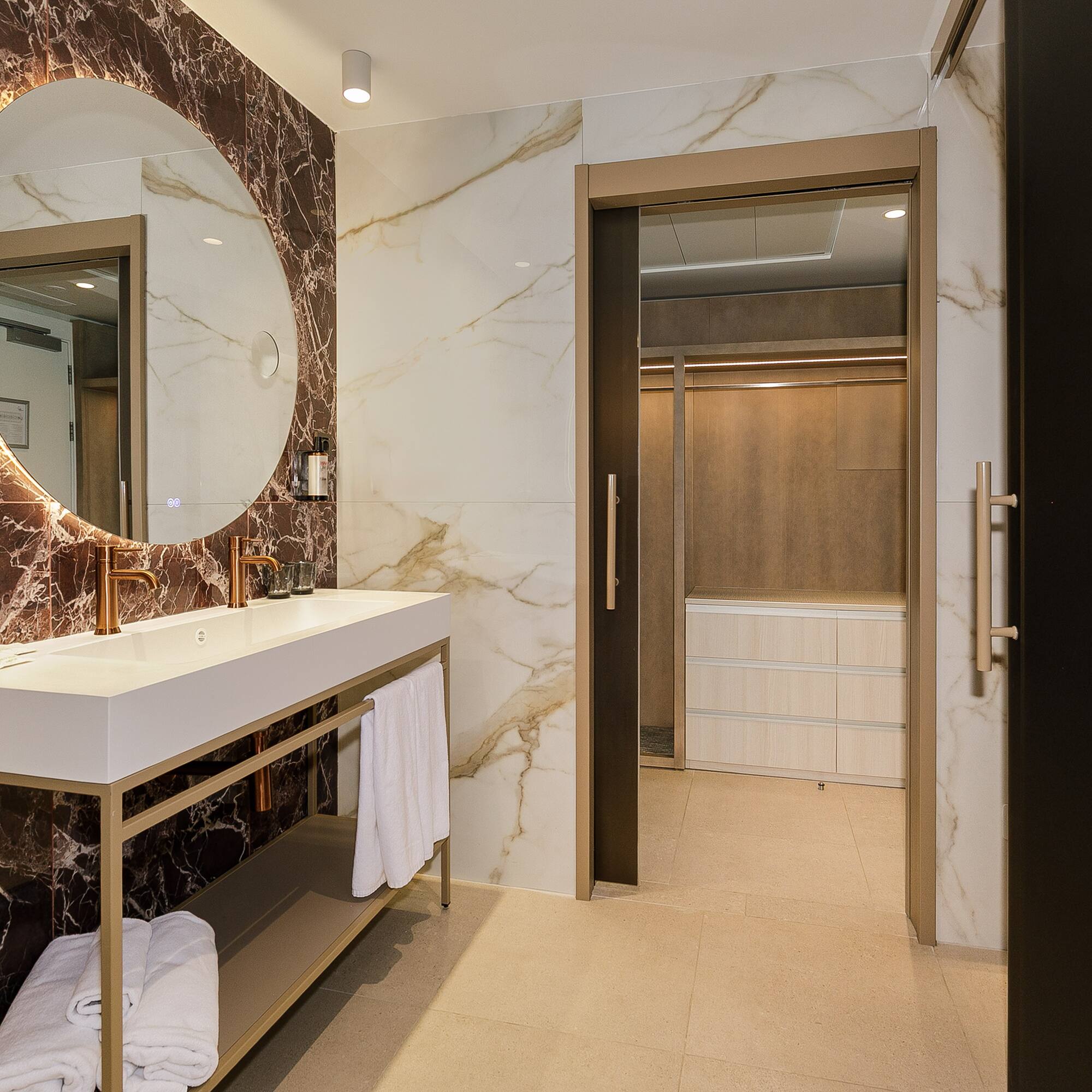 a bathroom with a mirror and a sink