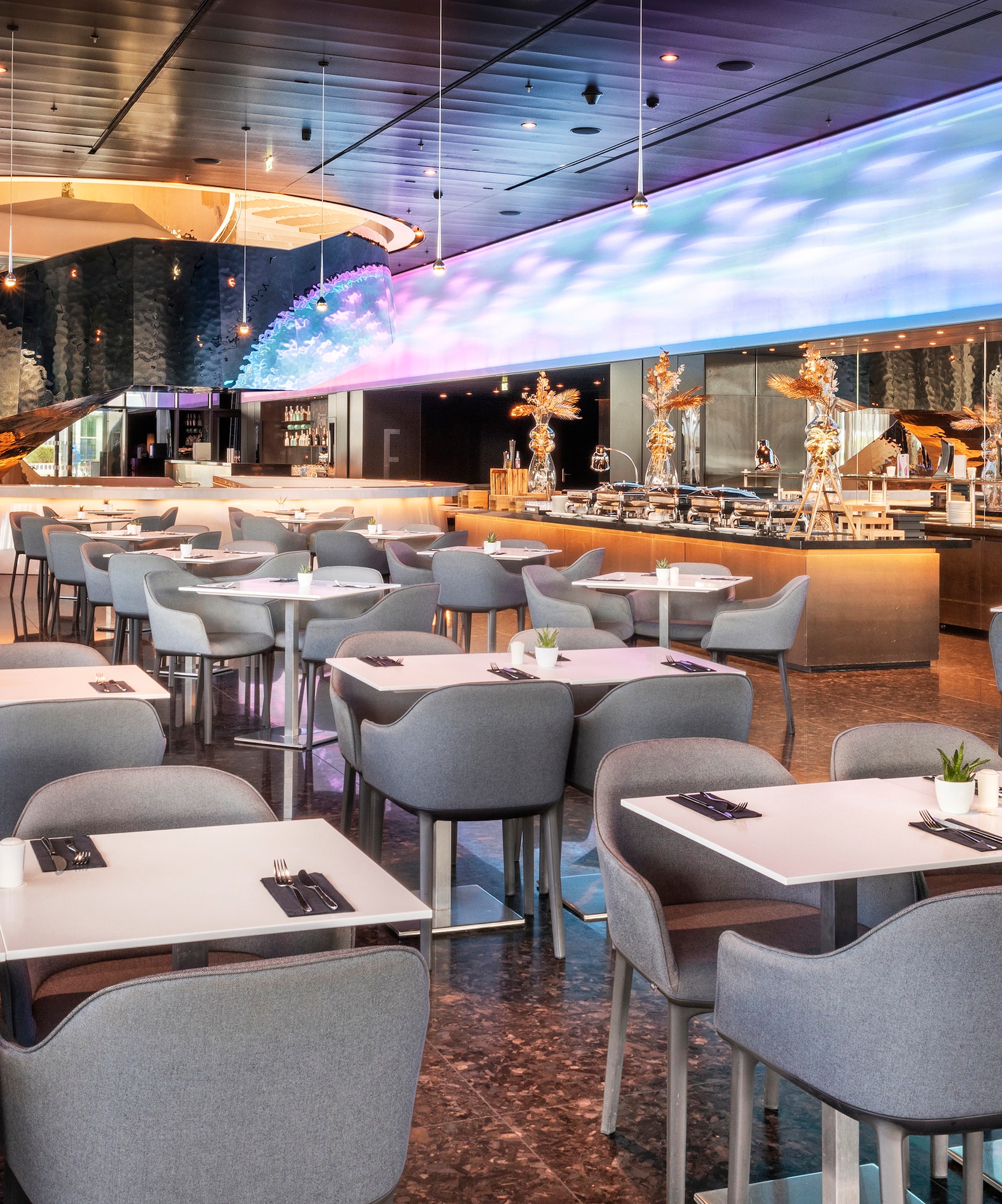 a room with tables and chairs