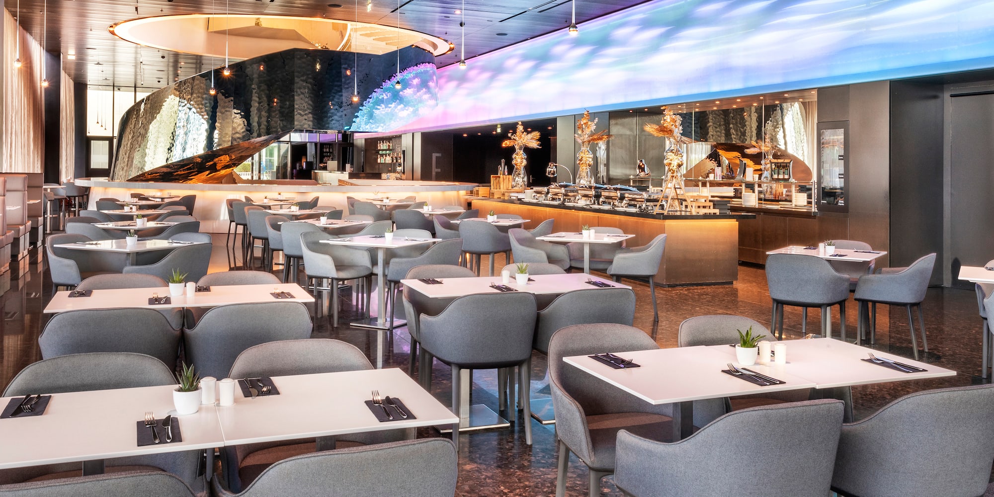 a room with tables and chairs