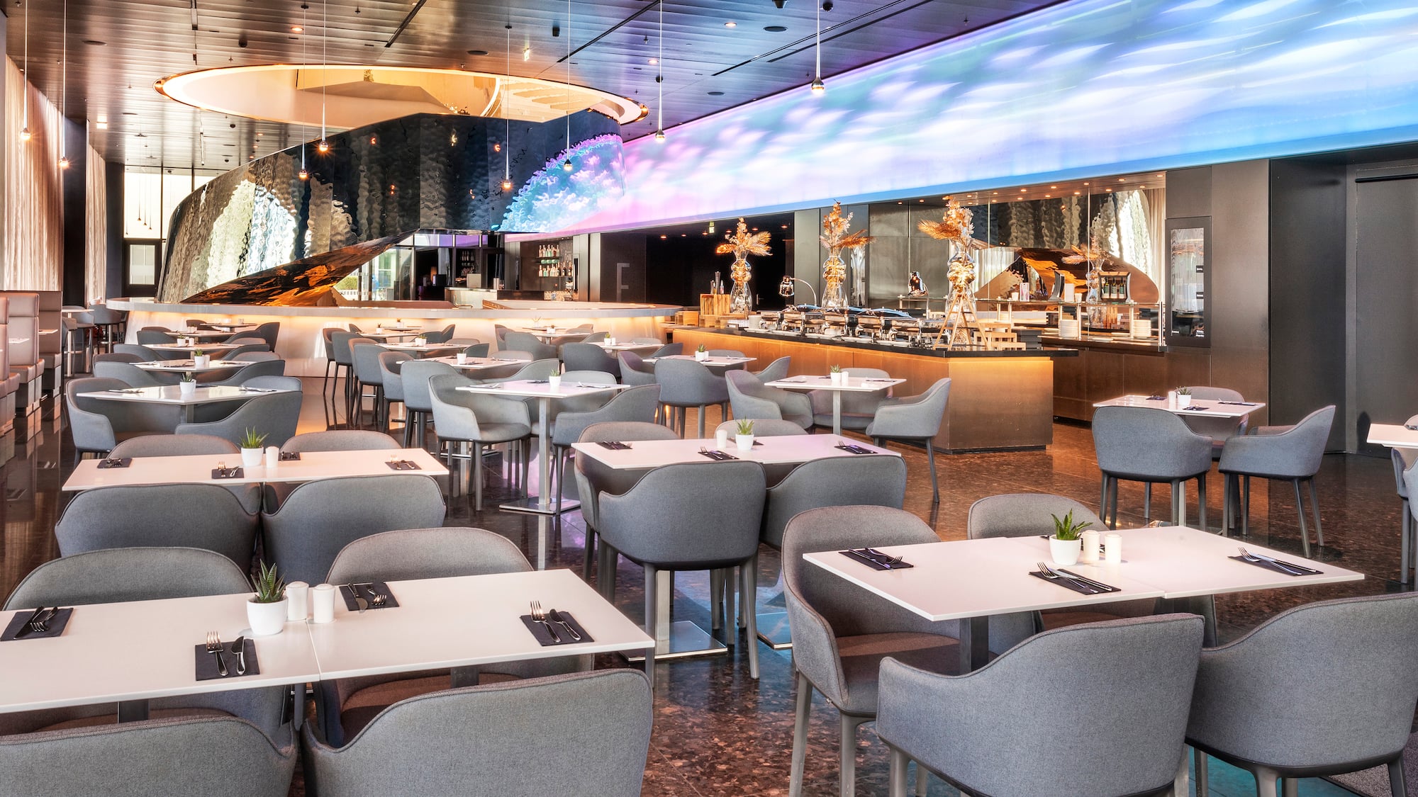 a room with tables and chairs