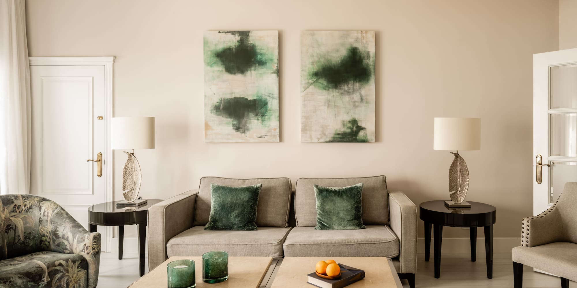 a living room with a couch and two tables