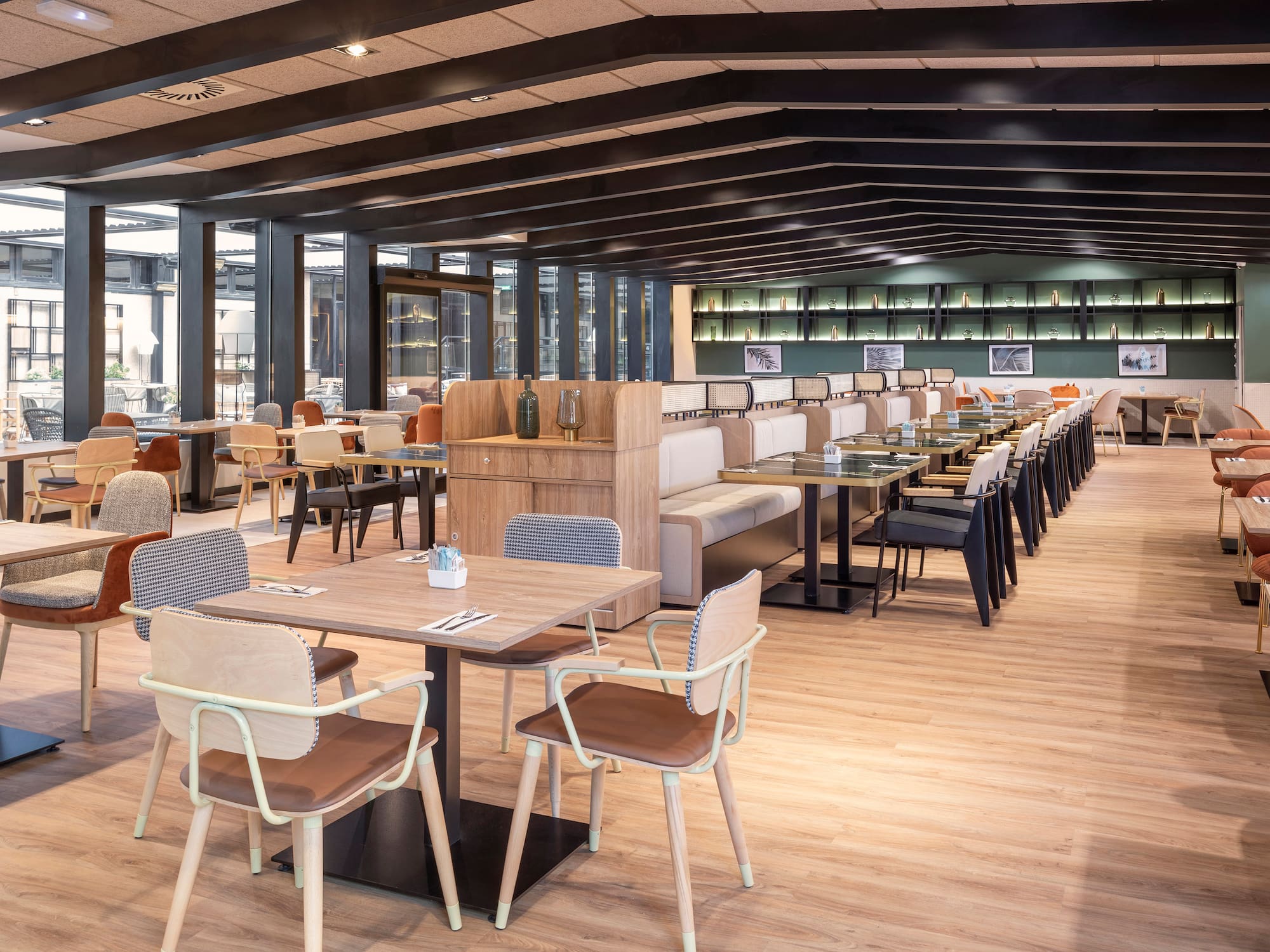 a restaurant with tables and chairs