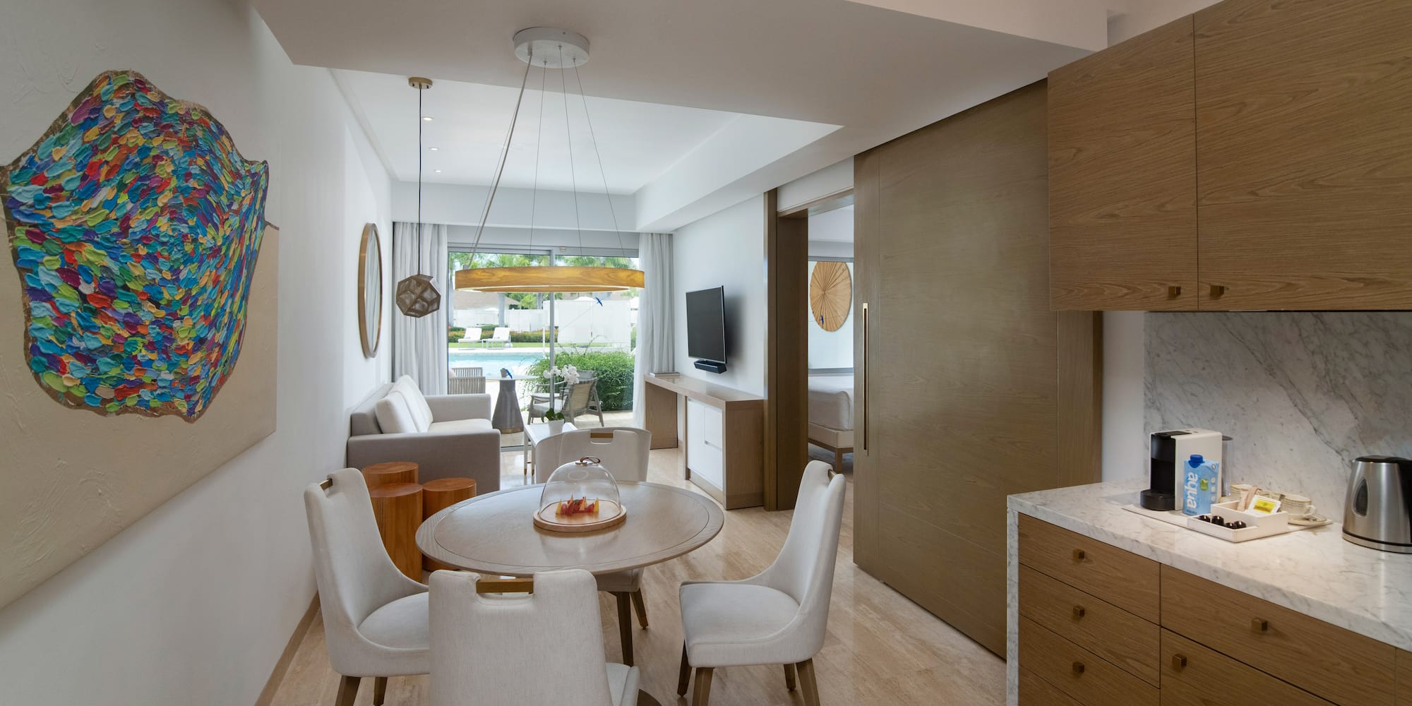 a room with a table and chairs