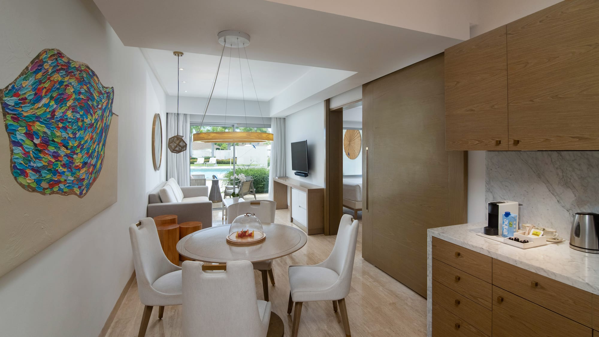 a room with a table and chairs