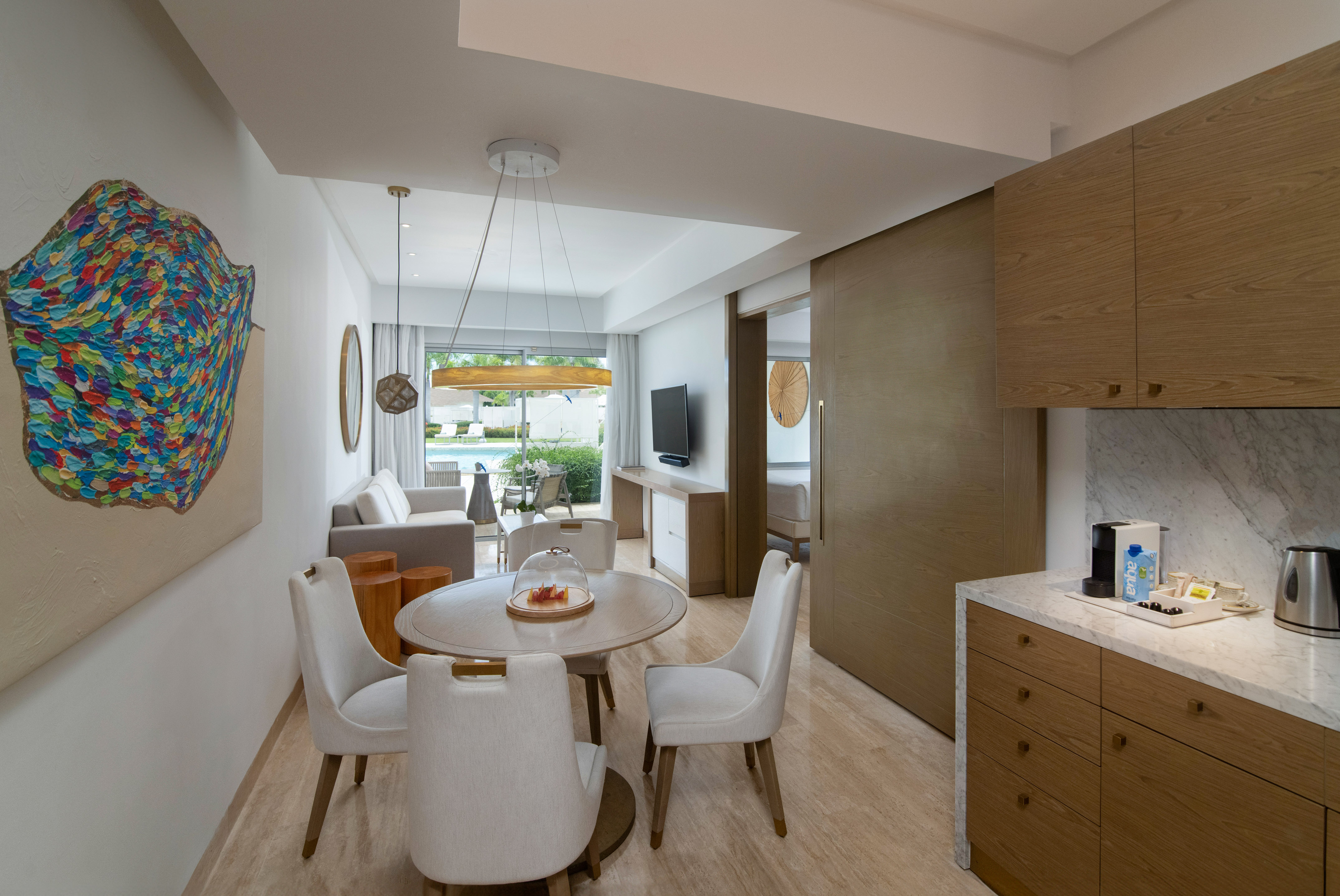 a room with a table and chairs