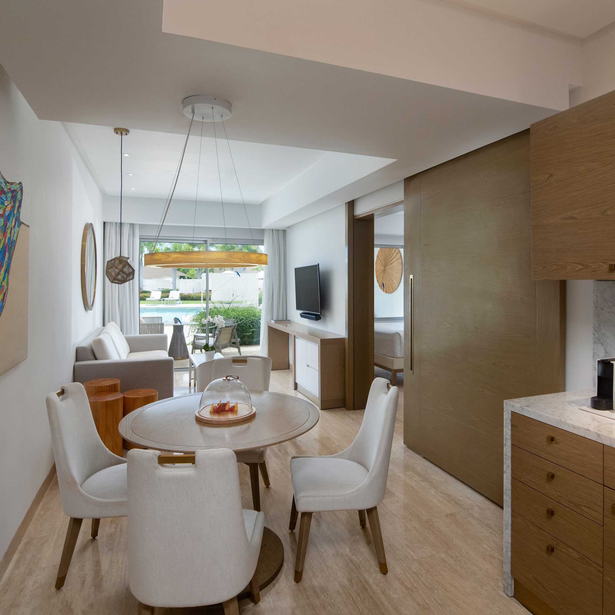 a room with a table and chairs