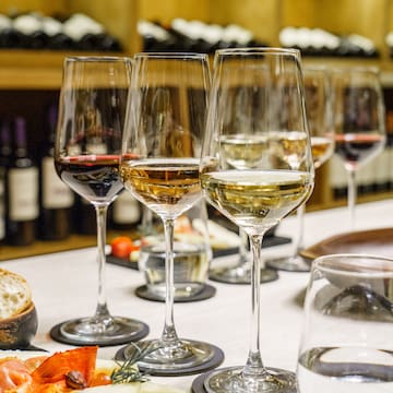 a group of wine glasses on a table