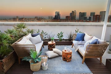 a patio with a view of a city