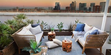 a patio with a view of a city