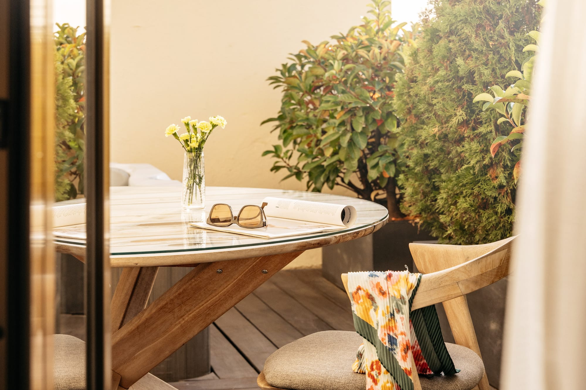 a table and chair on a deck