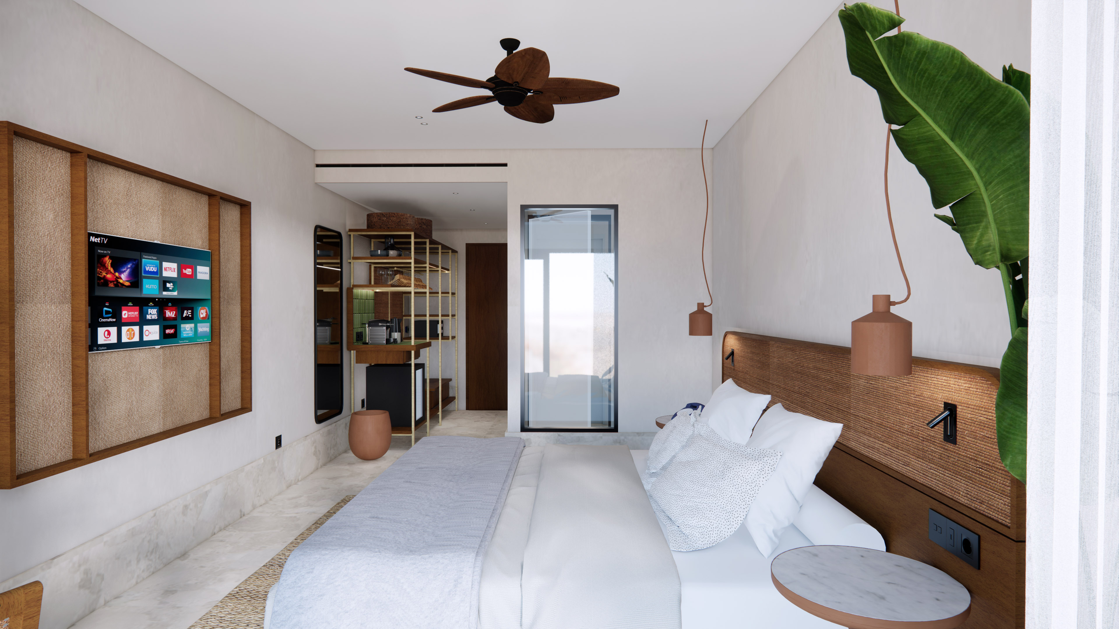 Modern hotel bedroom with king bed, smart TV, ceiling fan, and tropical plant.
