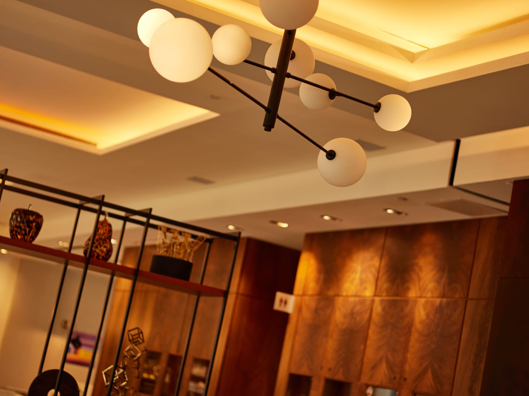 a chandelier with lights from the ceiling