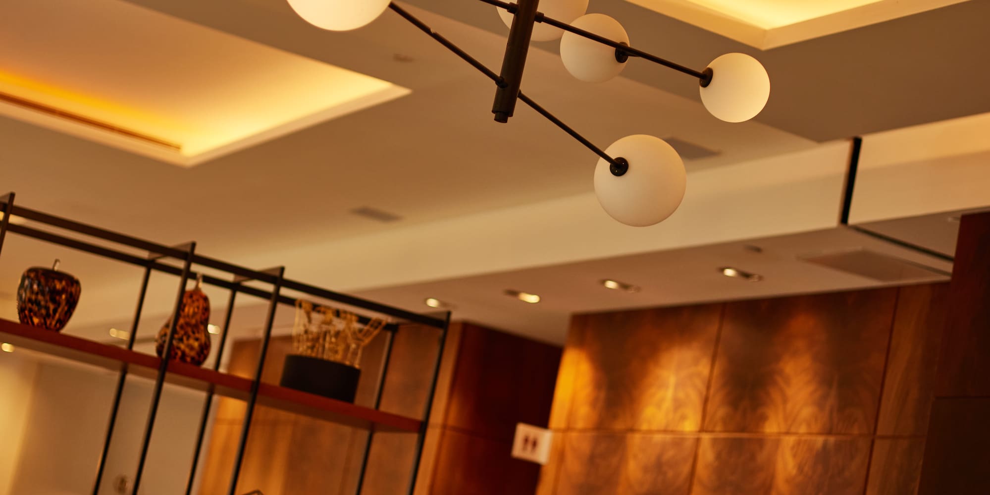 a chandelier with lights from the ceiling