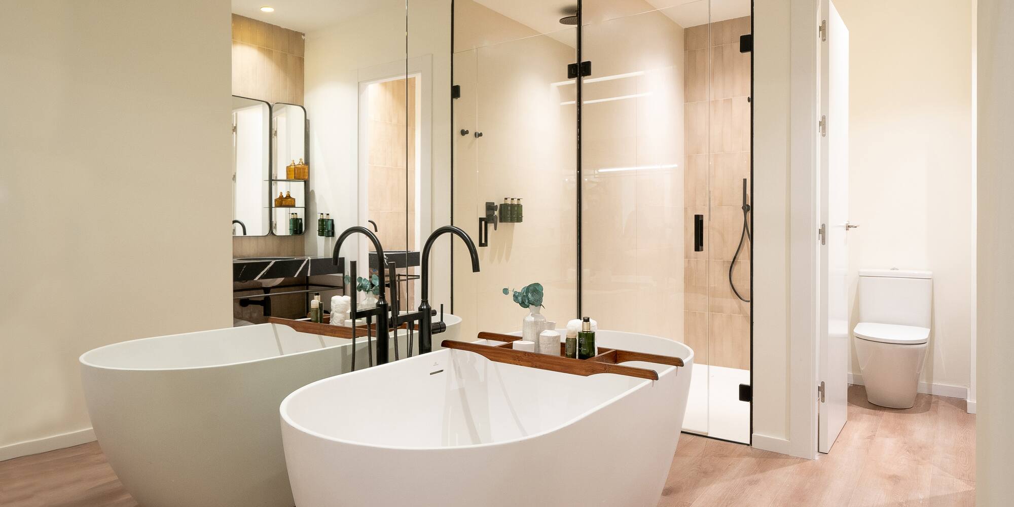 a bathroom with a tub and shower