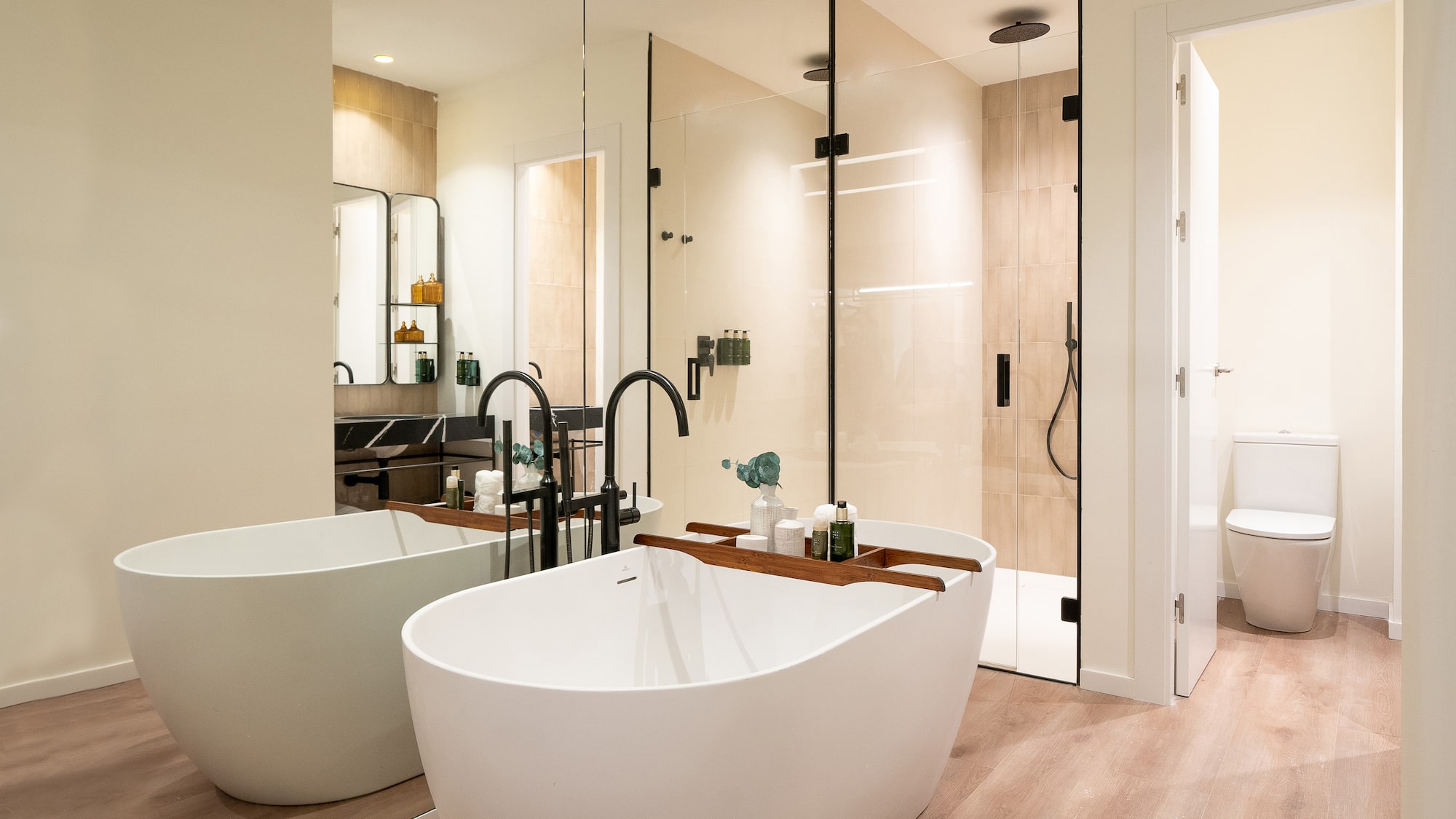 a bathroom with a tub and shower