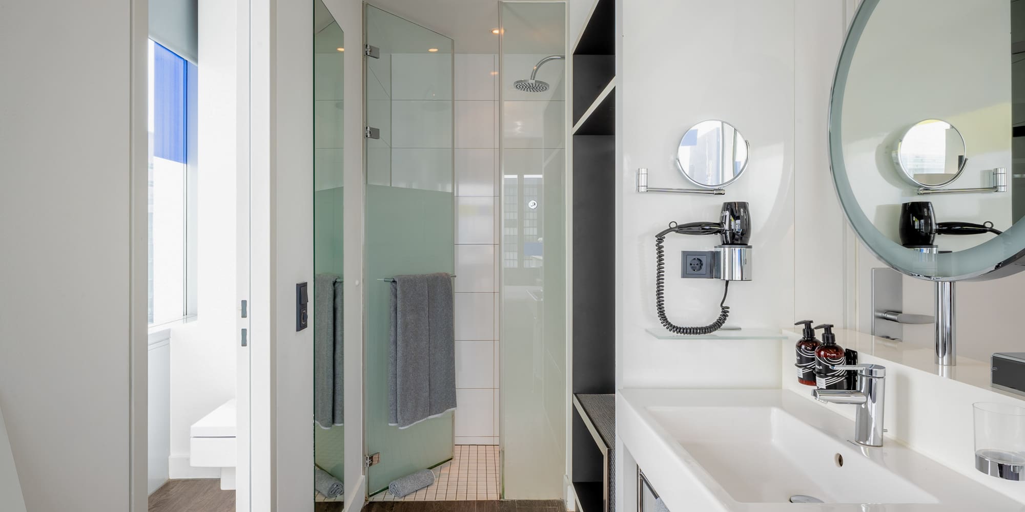 a bathroom with a mirror and sink