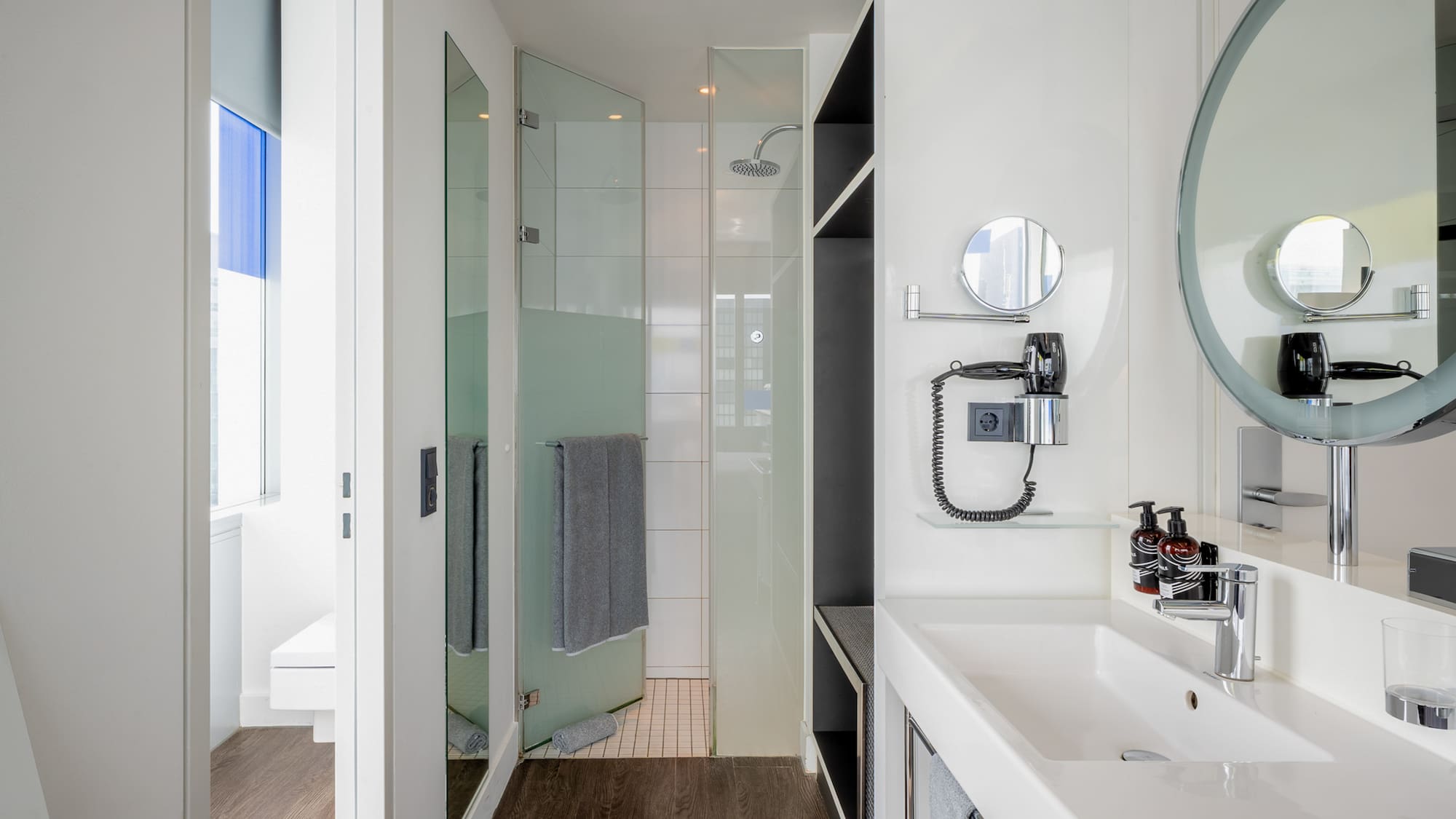 a bathroom with a mirror and sink