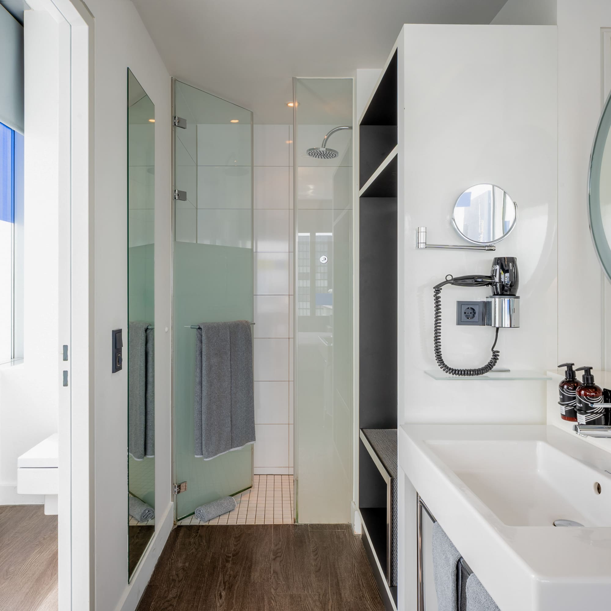 a bathroom with a mirror and sink