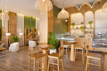 a room with tables and chairs