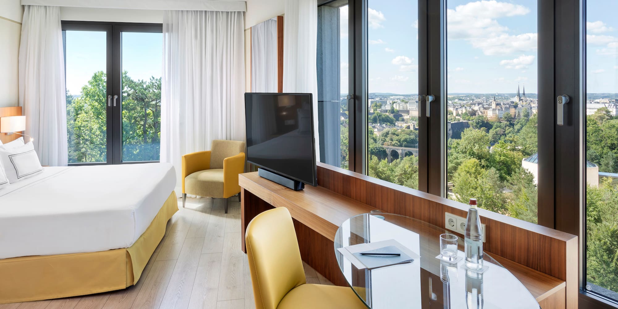 a room with a television and a table