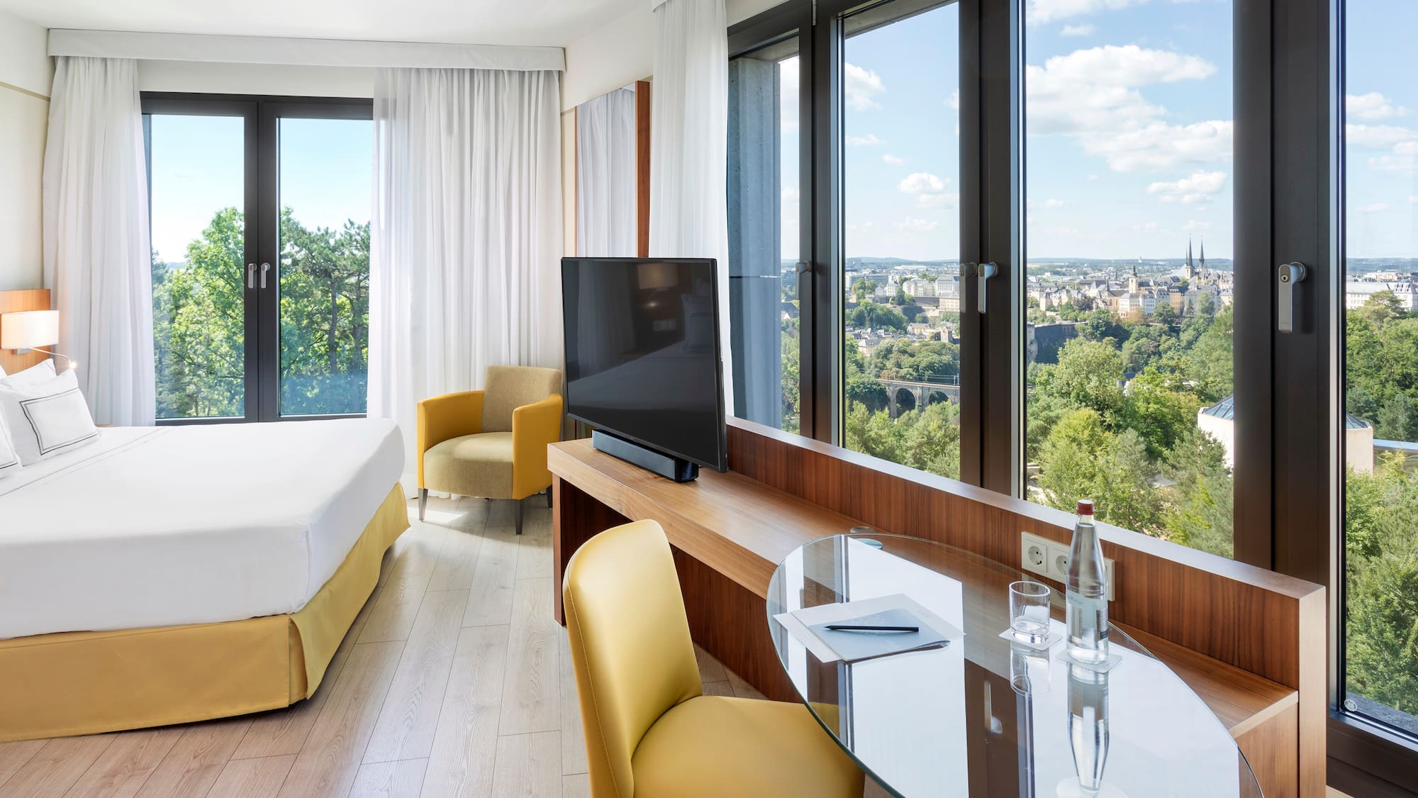 a room with a television and a table