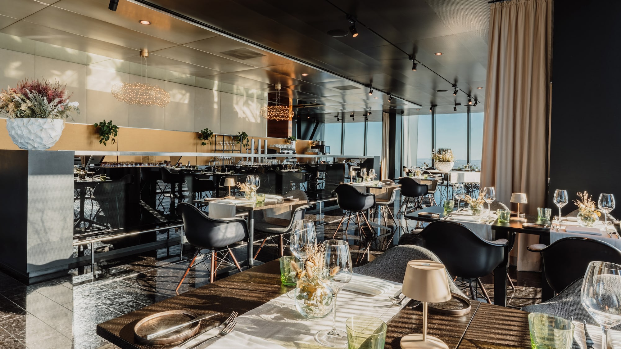 a restaurant with tables and chairs