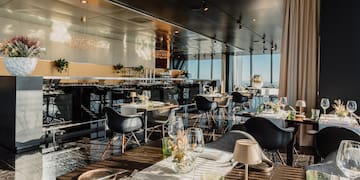 a restaurant with tables and chairs