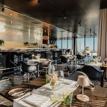 a restaurant with tables and chairs