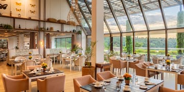 a restaurant with tables and chairs