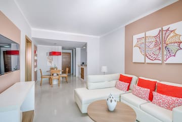 a living room with a couch and table