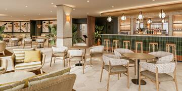 a room with chairs and tables