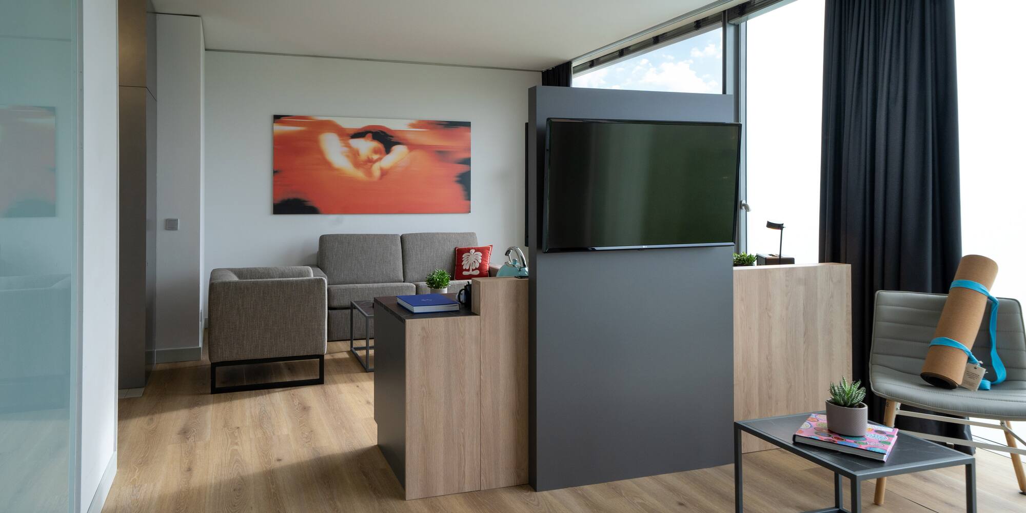 a room with a tv and a couch