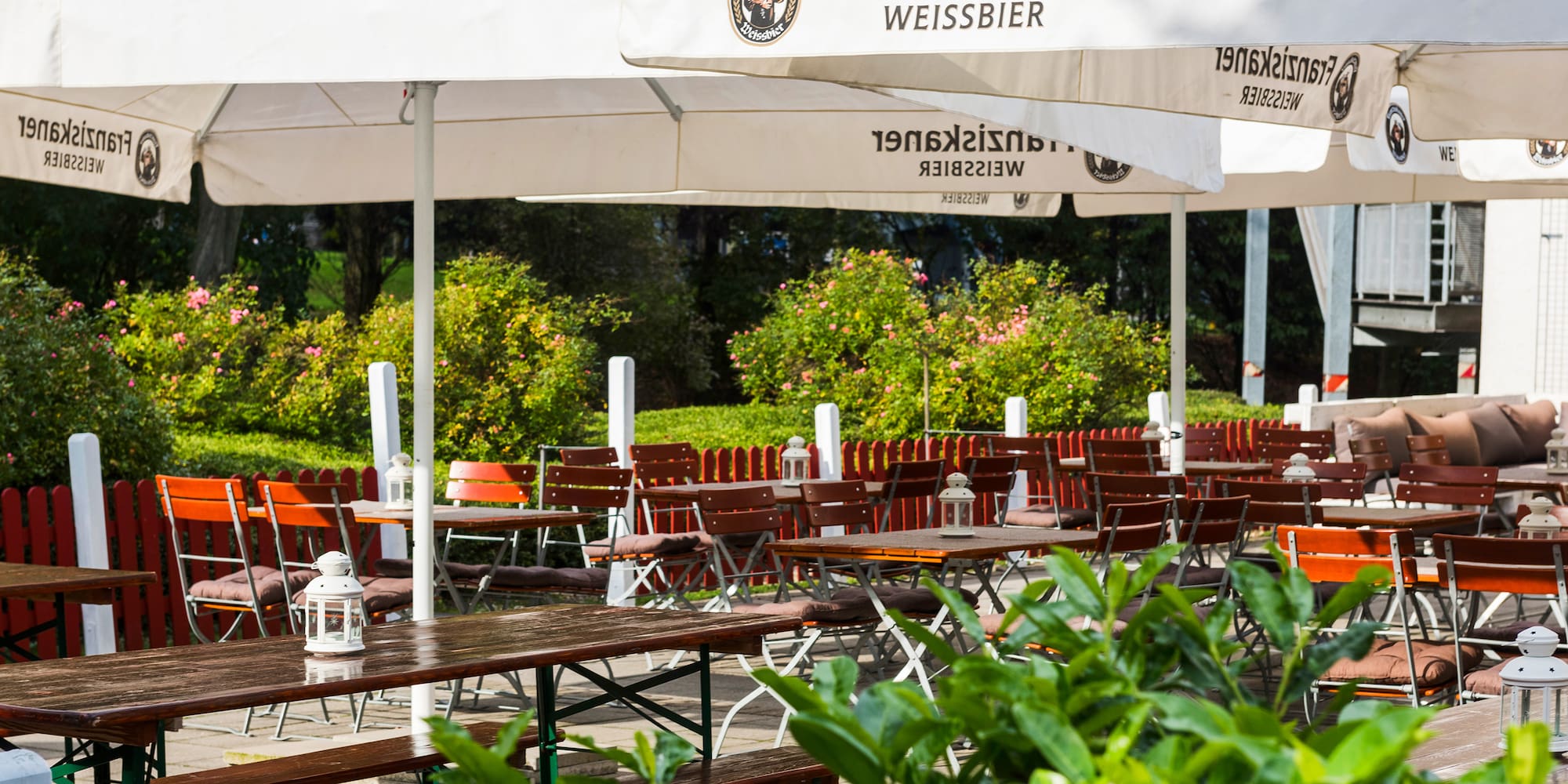tables and chairs under a canopy
