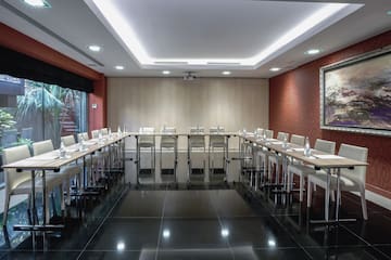 a room with tables and chairs