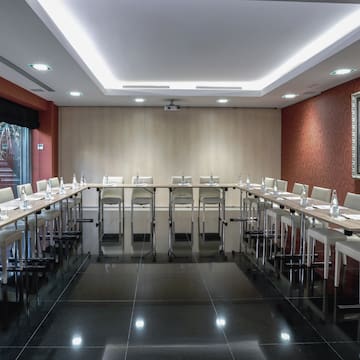 a room with tables and chairs