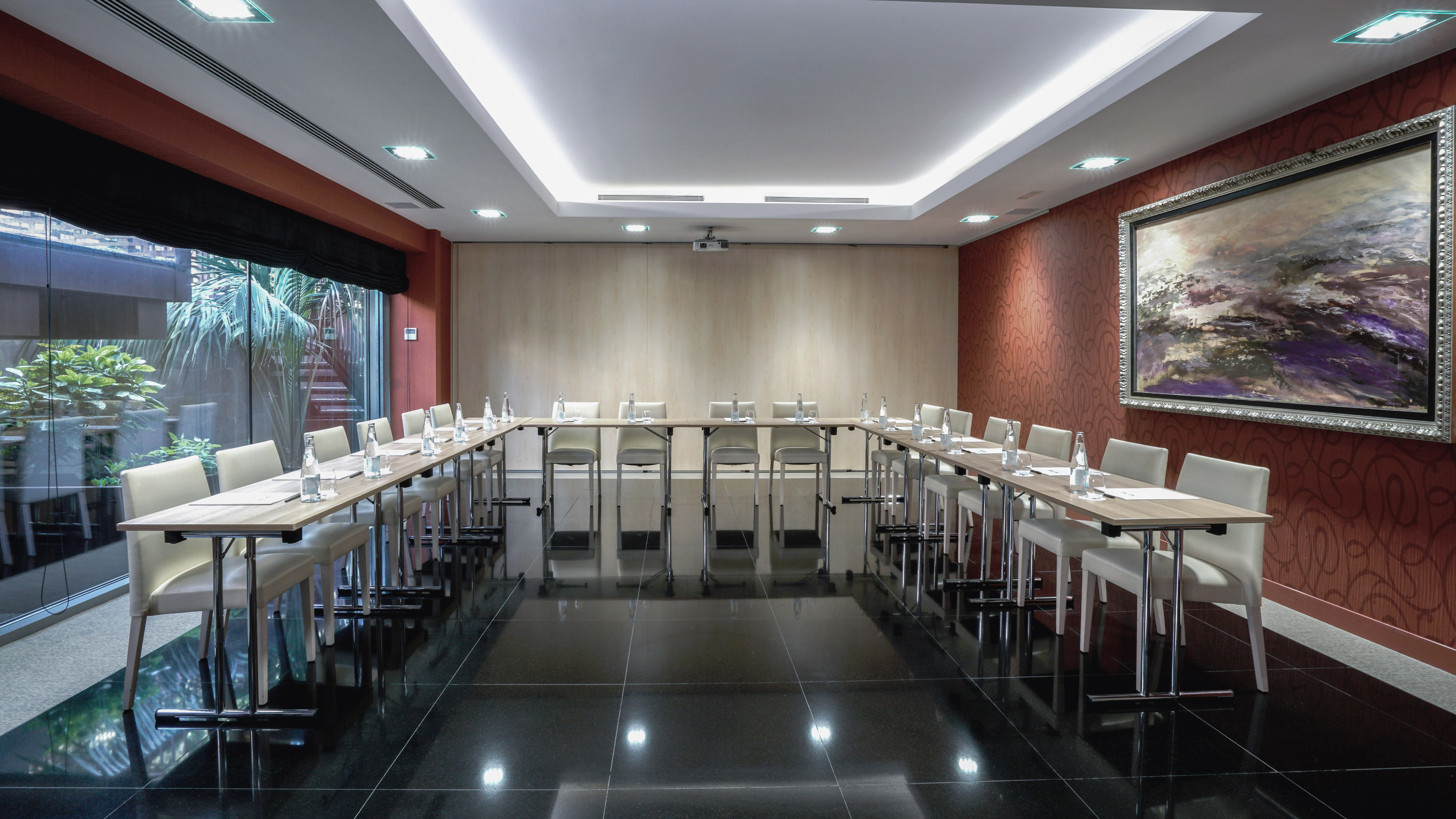 a room with tables and chairs