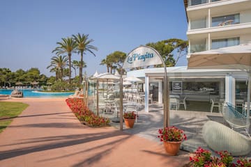 a pool and a building with a sign