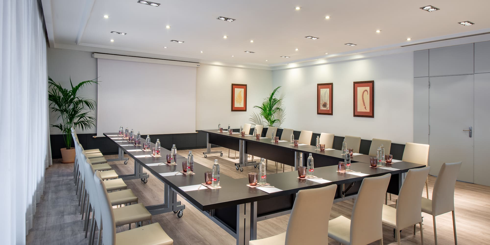 a room with tables and chairs