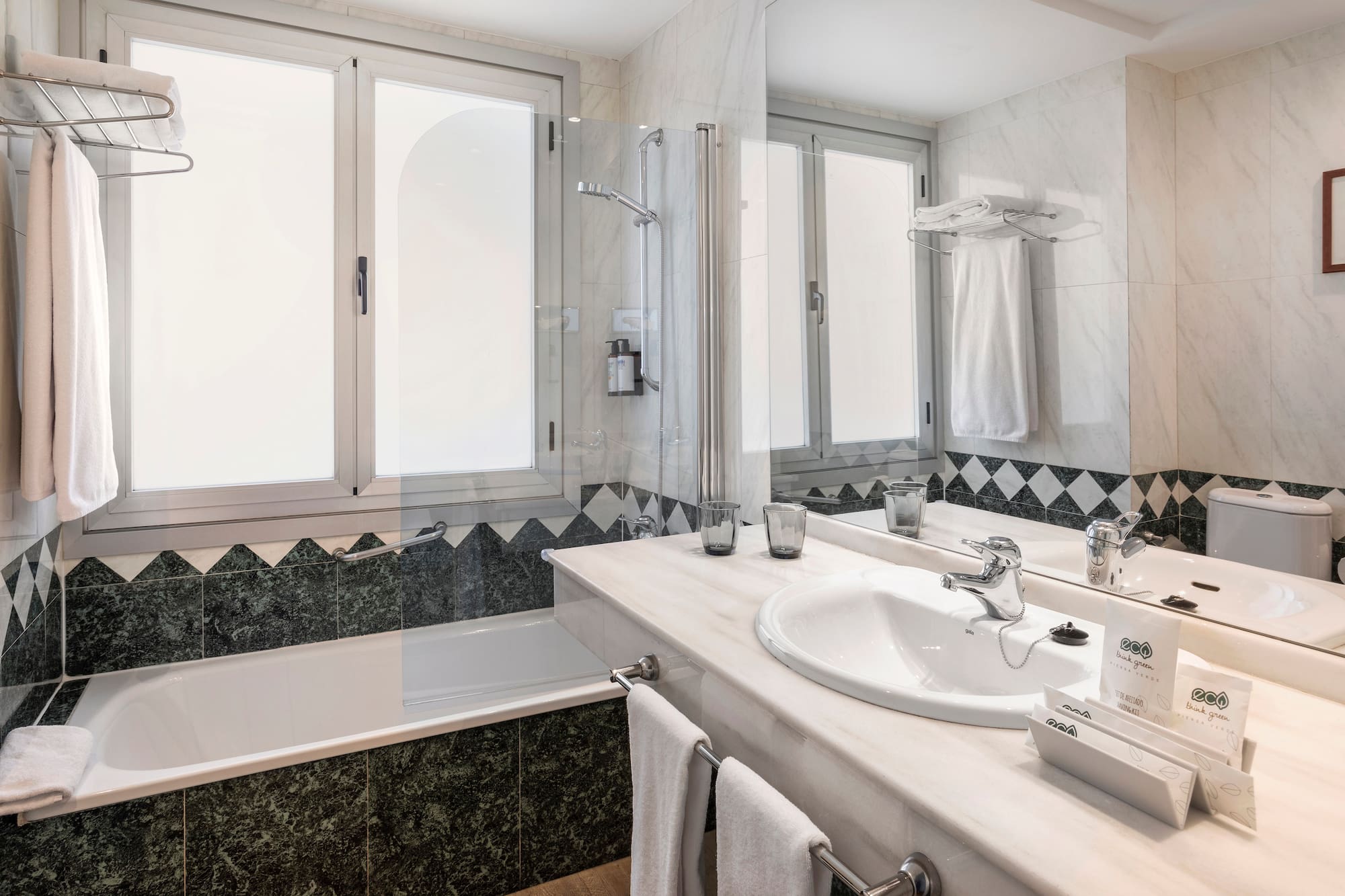 a bathroom with a tub and sink