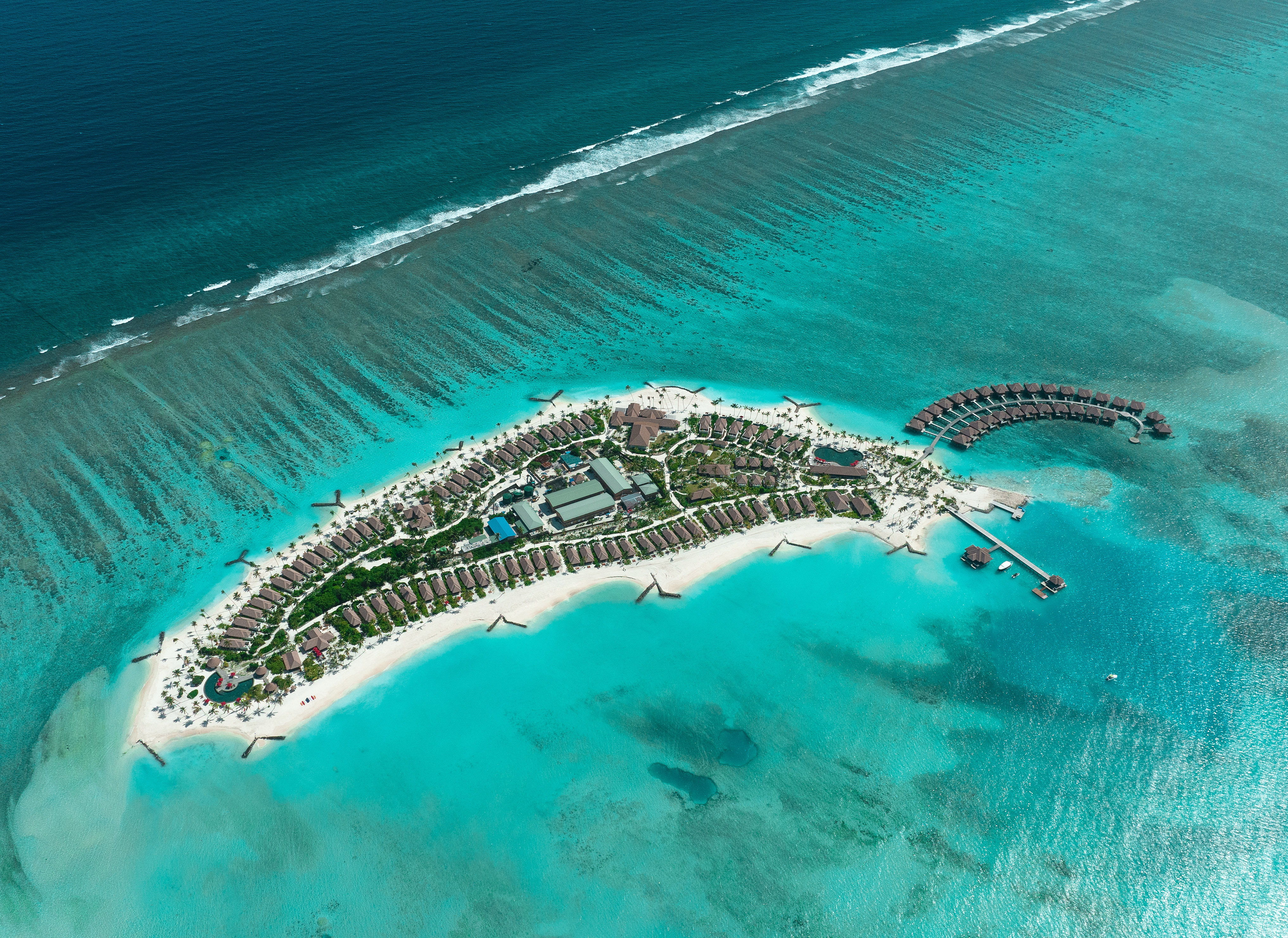 an island with buildings and a body of water