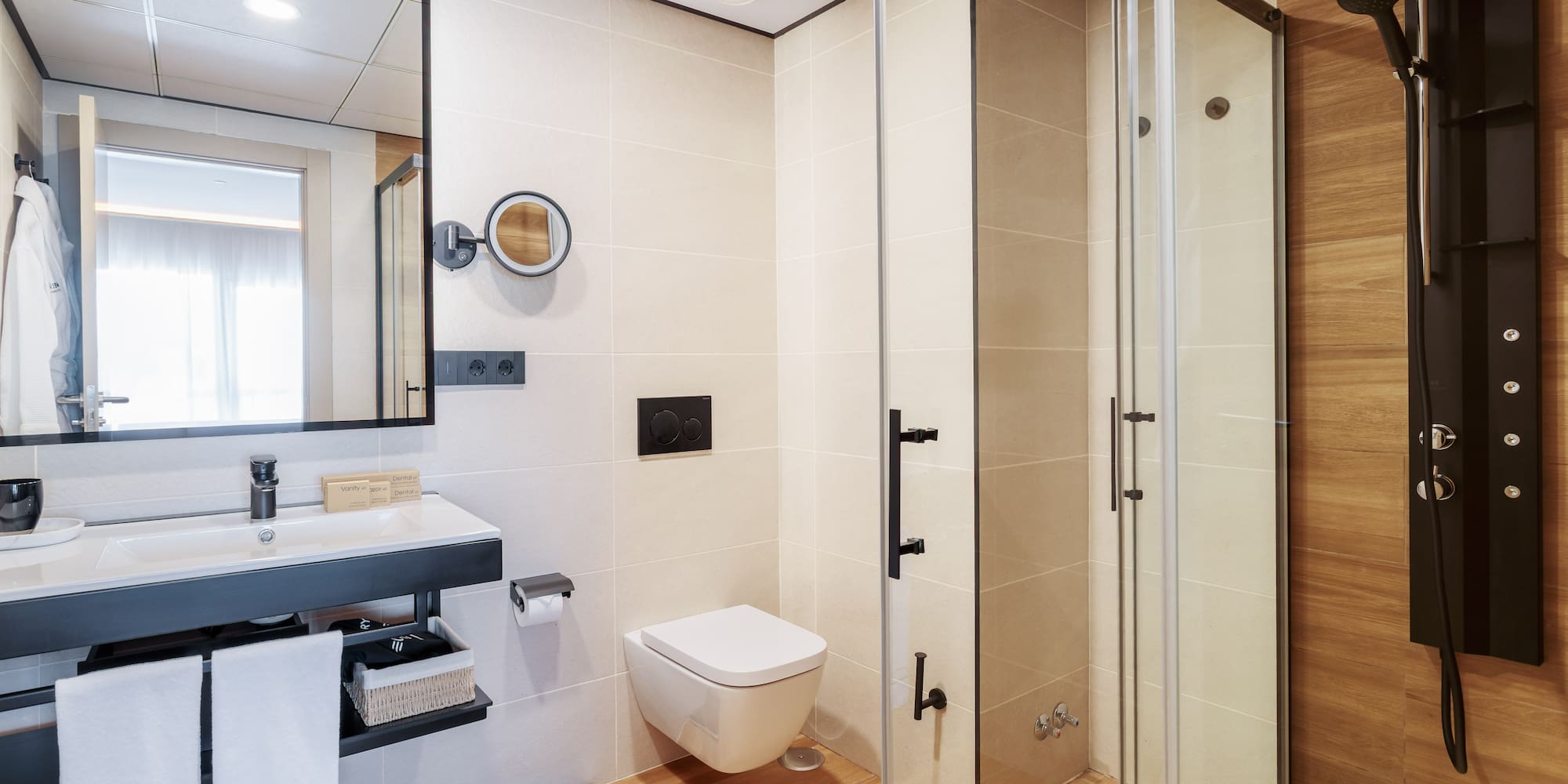 a bathroom with a shower and toilet