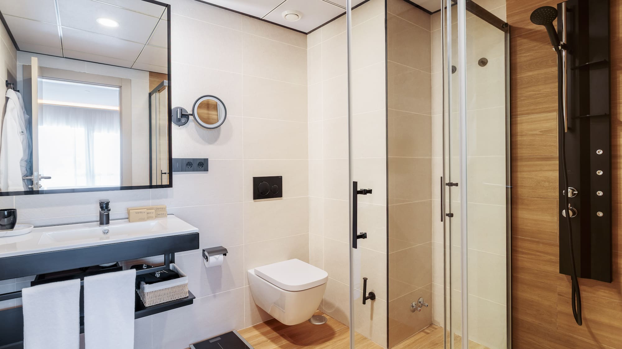 a bathroom with a shower and toilet