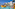 Resort kids' pool with pirate ship, water slides, tropical hotel, and palm trees.
