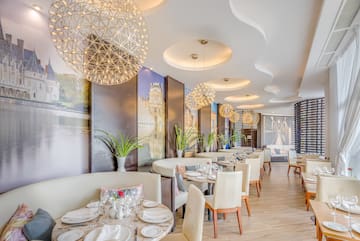 a room with tables and chairs