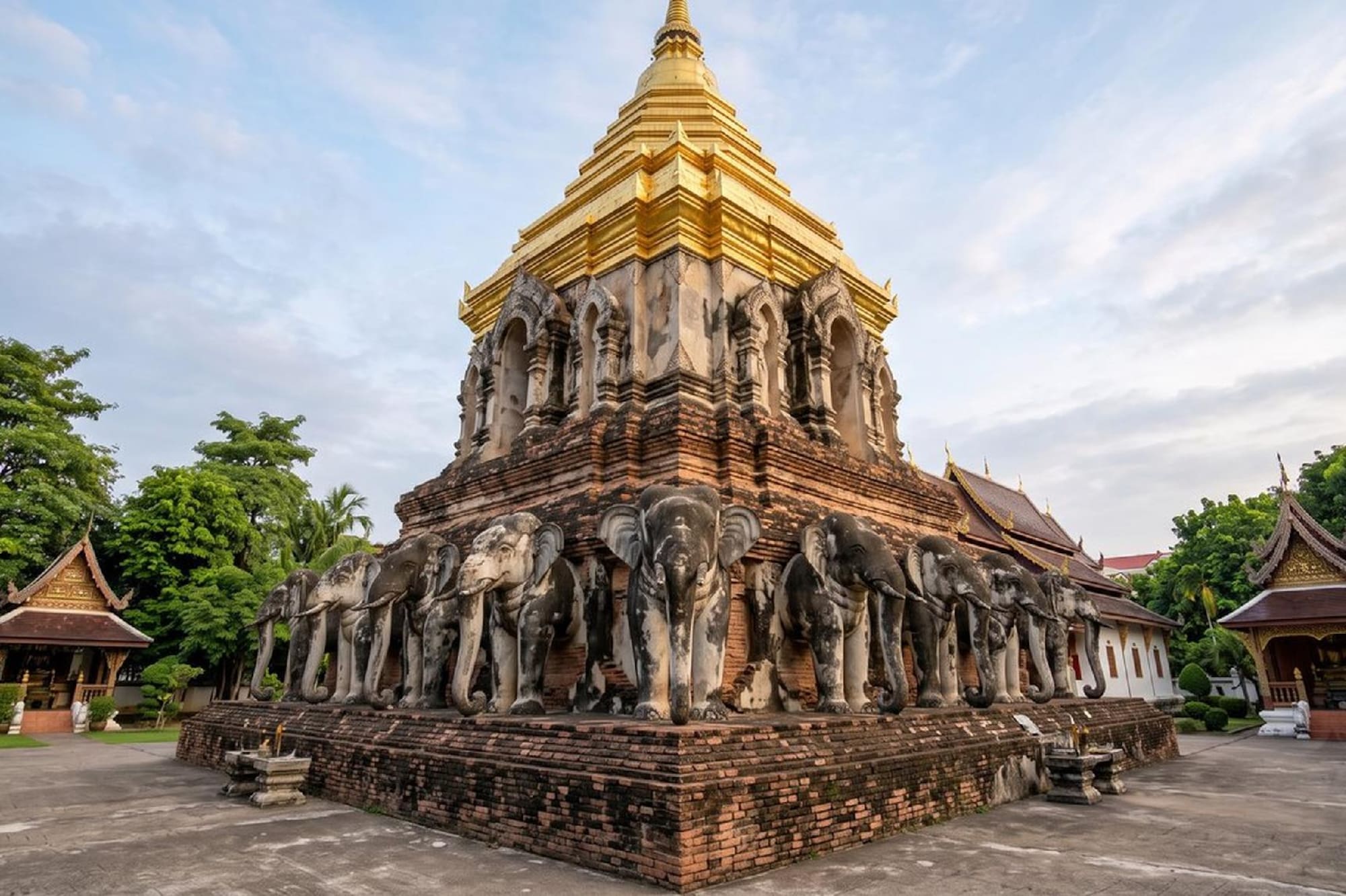 Golden stupa and elephant statues at Wat Chiang Man temple, Chiang Mai.