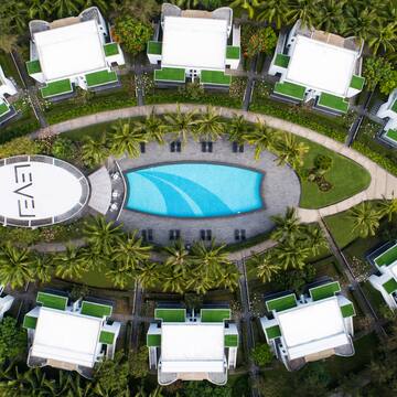 a pool in a circle with buildings around it