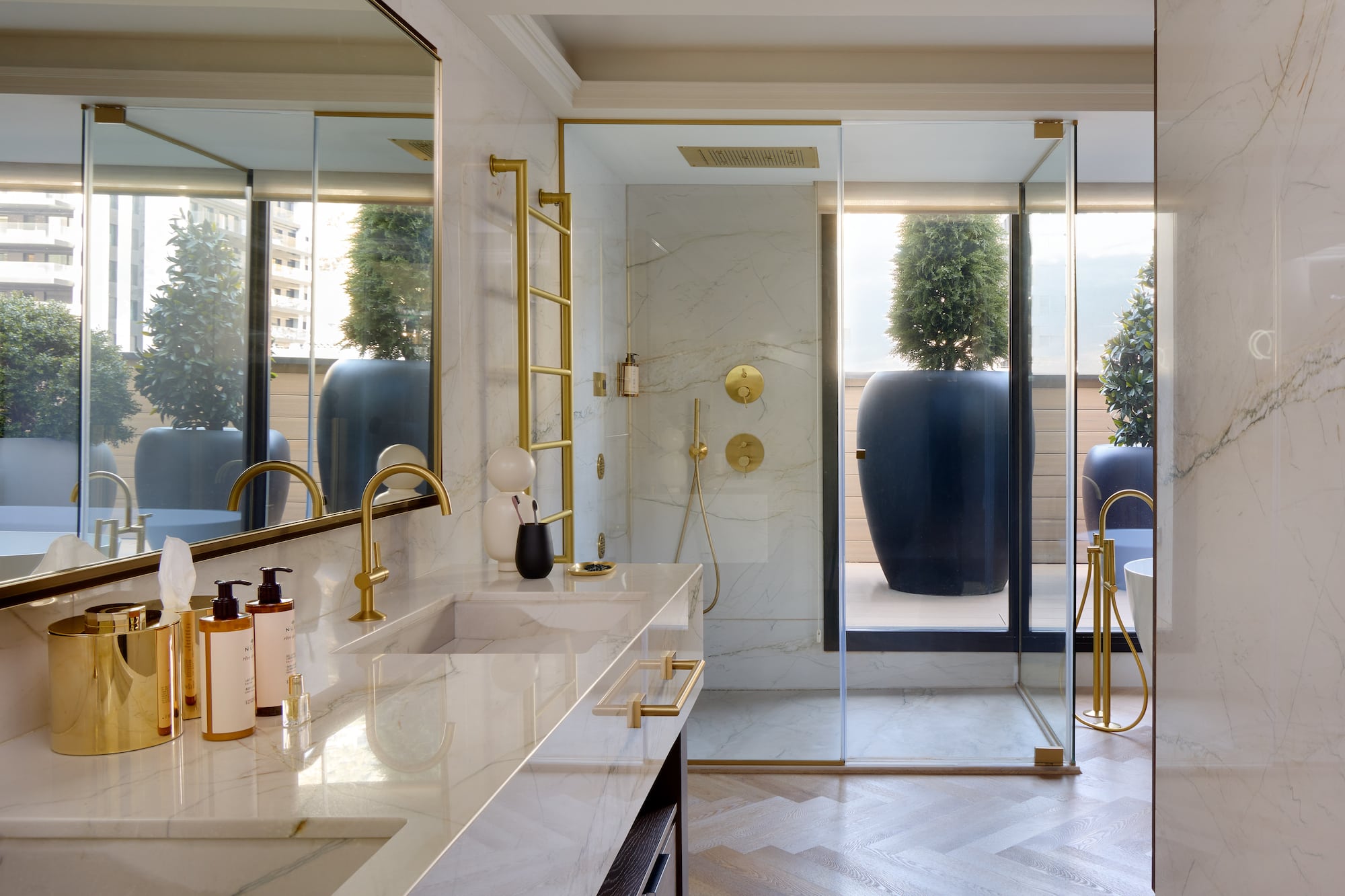 a bathroom with a shower and a large tub