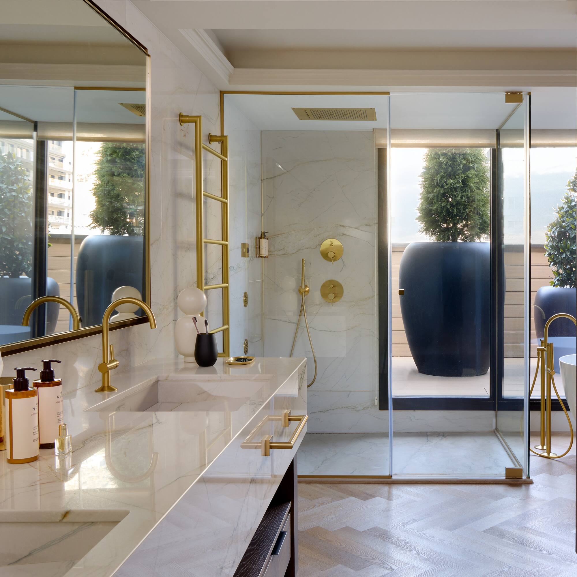 a bathroom with a shower and a large tub