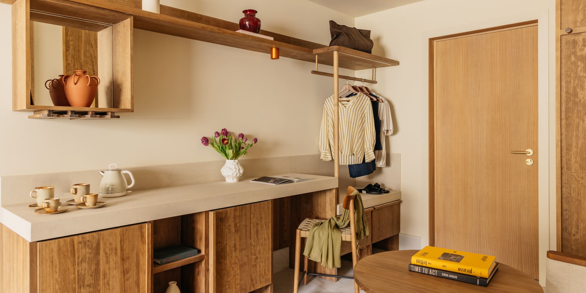 a room with a table and shelves