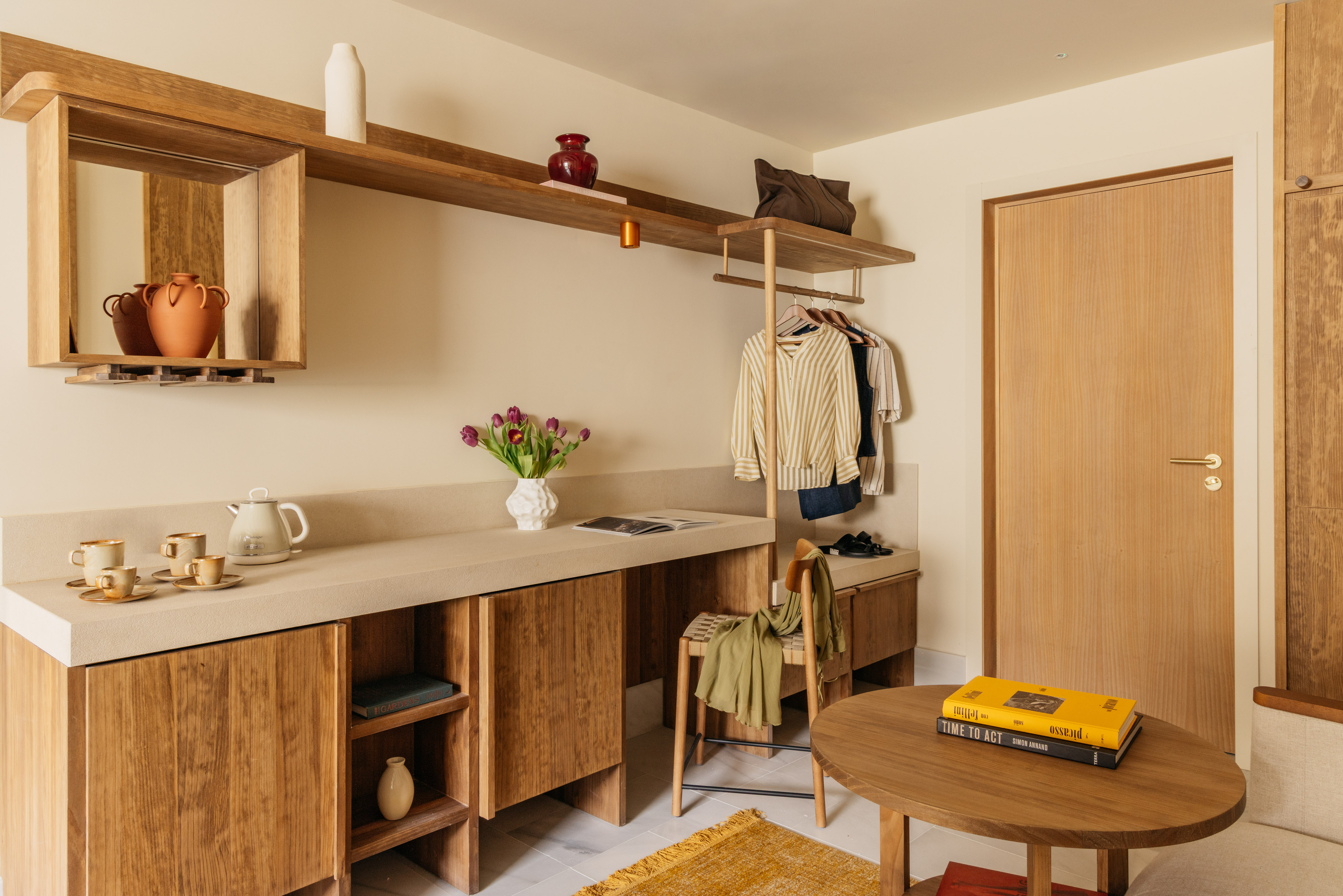 a room with a table and shelves
